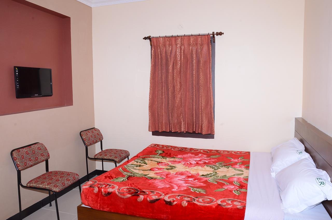 Отель Ezhil Residency Кодайканал Экстерьер фото