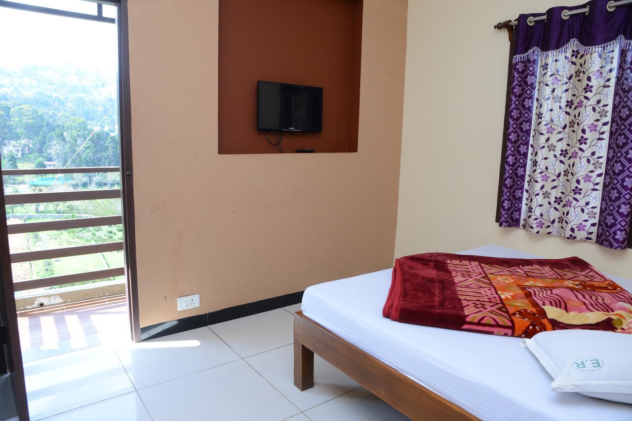 Отель Ezhil Residency Кодайканал Экстерьер фото